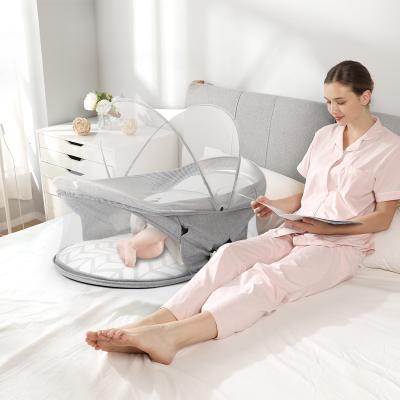 China Travel Portable Foldable Professional Foldable Nest Cradle Bed Outdoor Home Newborn Baby Crib with Mosquito Net for sale