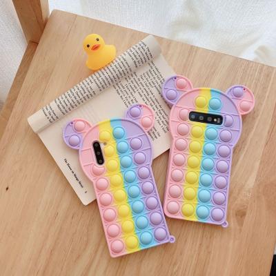 China Anti-fall Rainbow Phone Case Pushing Person Toy Case For Samsung Note 9/10/20/S9/S10/S20 With Plush Toy for sale