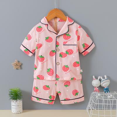 Chine Le pyjama de cardigan de modèle de fraise a placé le bouton respirable de taille de 140cm vers le haut de l'ensemble de pyjamas à vendre