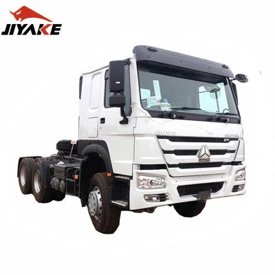 China Factory Direct Sale Sinotruk HOWO Towing Truck LHD RHD Engine Tractor Truck With Trailer 6800x2490x3668 for sale