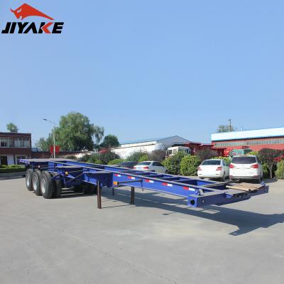 China Truck Trailer 2 Axle/3 Axle 20FT 40FT Transport Container Chassis Skeleton Semi Trailer With Low Bed Locks Skeleton Semi Trailer for sale