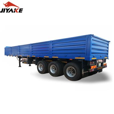 China Truck Trailer Good Price Customized 2/3/4 Axles 40 50 60 Ton Sidewall Trailer Dropside Cargo Board Barrier Trailer Truck Sidewall Semi Trailers for sale