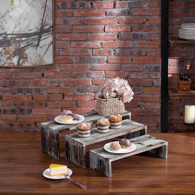 China Handmade set of 3 torched wooden retail display risers for sale