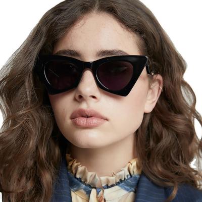 China Fashion Plastic Colorful Cat Eye Sunglasses 2022 New Sunglasses Hollow Out Wave Frame Sunglasses Fashion Retro Sun Glasses for sale