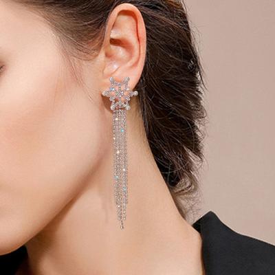 China TRENDY Flashing Snowflake Shaped Diamond Tassel Earrings Simple Light Luxury Long Trend Elegant Jewelry For Women for sale