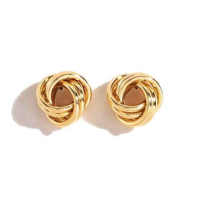 China FASHIONABLE style irregular shape earrings flower explosive earrings made of copper alloy creative flower wrapped twisted stud earrings for sale