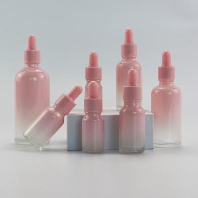 China 20ml Refillable Romantic Pink Color Boston Round Perfume Bottles Glass Bottle With Graduated Pipette for sale