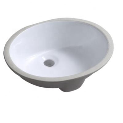 China Undermount 1512 Inch Traditional White Oval Porcelain Basin Ceramic Bathroom Sink for sale