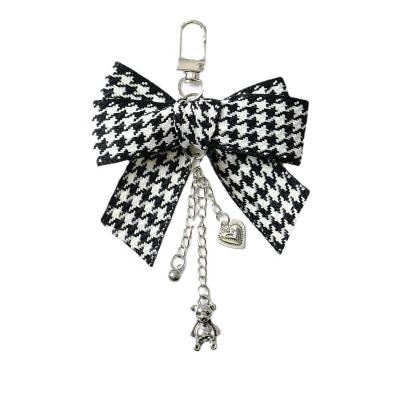 China The Other Key Small Black And White Bear Shell Mobile Phone Gift Ribbon Bow Diamond Car Key Chain Pendant Plaid Pendant for sale