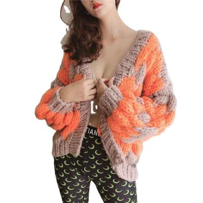 China Anti-wrinkle sweater maker fashion knitted cardigan contrast color wavy grain lantern sleeves thick handwoven cardigan jacket woman for sale