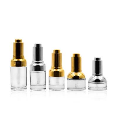 China 20ML 30ML 40ML Perfume Essence Serum Essential Oil Glass High Quality Recyclable Glossy Transparent Bottle With Gold Dropper Rubber Head for sale