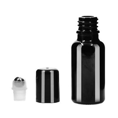 China Personal Care 20ml Round Roll Black On Essential Oil Perfume Eye Cream Glass Bottle With Roller And Foil Cap for sale