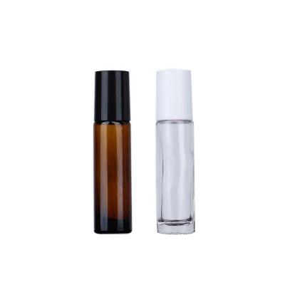 China 10ml 15ml Essence Cream Travel Pack Perfume Sample Glass Recyclable Clear Amber Blue Black Blue Bottle High Quality With Stainless Steel Roller for sale