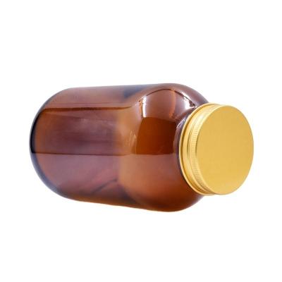 China Eco - Friendly Recyclable Wholesale Empty Amber Glass Bottle Cap 500ml Bottle With Gold Aluminum Lid for sale