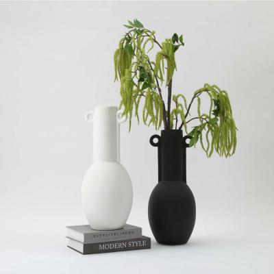 China Art Decor Minimalist Modern Matte Porcelain Amphora Black Ceramic Bilateral Vase for Home Decor for sale