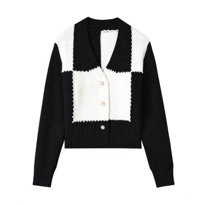 China New Black And White Bead Mosaic Manufacturer Knitwear Anti-wrinkle Short V-neck Sweater Women'S Cardigan Sweater for sale