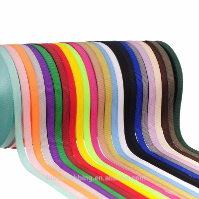 China Wholesale Custom High Tenacity Fashion Debossed Nylon Jacquard Webbing Band Logo Woven Polyester Strap For Belts for sale