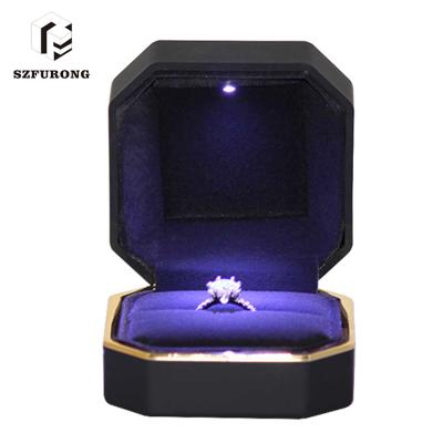 China Performance For Jewelry 75*75*52Mm Gift Packaging Black Plastic Led Lightweight Ring Box for sale