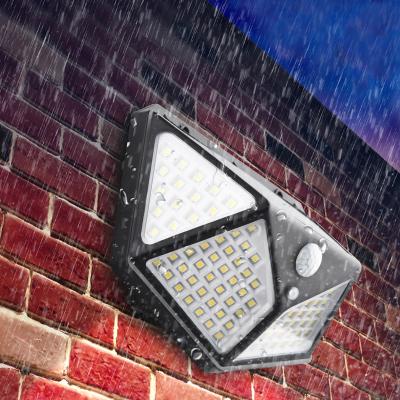 China New residential solar rechargeable 100led wall lamp with four sides human body induction lamp glowing outdoor lighting modern courtyard for sale