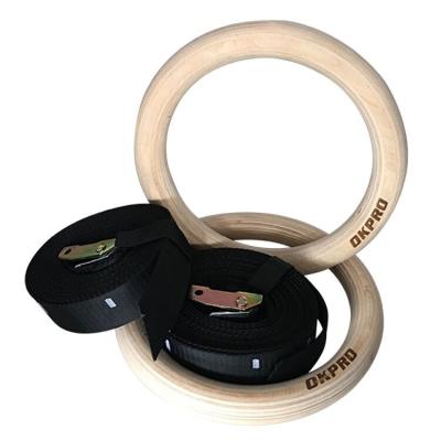 China OKPRO Universal Gym Fitness Nylon Strap Wooden Gymnastic Rings for sale