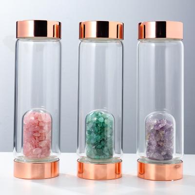 China Custom Natural Rose Gold Quartz Logo Viable Crystal Glass Water Bottle Bamboo Crystal Water Bottle With Crystal inside for sale