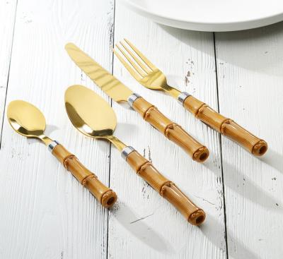 China Sustainable Hot Sales Food Grade Flatware Spoon Fork Classic Wood Design Handle Stainless Steel Plastic Cutlery Set for sale