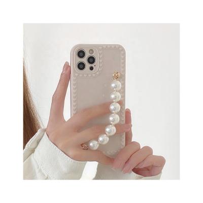 China For iPhone SE3 Luxury Pearl Case Hand Chain Fairy Shockproof Phone Case With Pearl For iphone 13 pro case for girls for sale