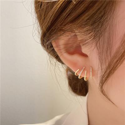 China Popular Autumn Winter High Sense Minority Style Claw Ear Clip Stud Earrings Korean Environmentally Friendly Design Four Soft Earrings for sale