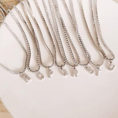 China Environmental Friendly 26 Letter Necklace Gold Plated Zircon Silver Letter Dangle Necklaces For Women for sale