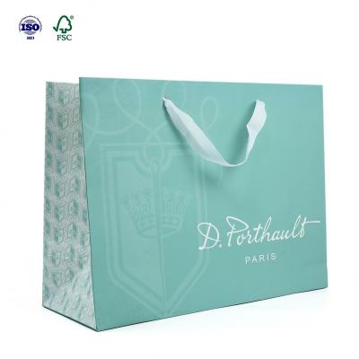 China Recyclable Retail Mint Green Reusable Flat Folding Gift Shopping Paper Bags With Ribbon for sale