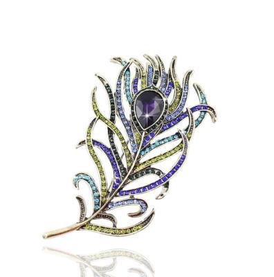 China Wedding Elegant Crystal Feather Brooch Rhinestone Fashion Zinc Alloy And Pins For Women Men Jewelry for sale