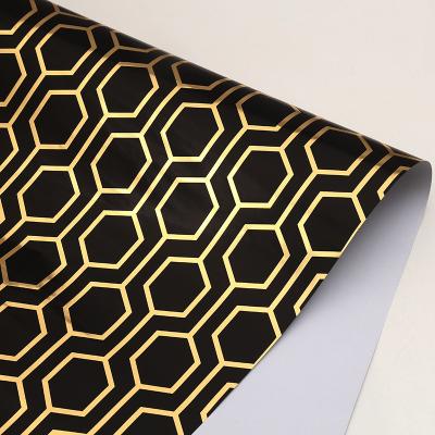 China China thickened holiday coated paper box packaging thin paper wholesale geometric series bronzing gift wrapping paper for sale