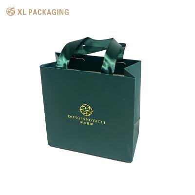 China Luxury Boutique Jewellery Gift Bag Custom Printed Ribbon Paper Souvenir Shopping Bag for sale