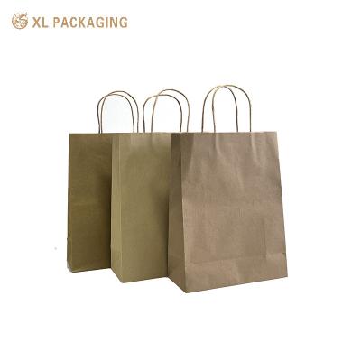 China Bolsas de regalo de papel impreso Bolsa de papel reciclado Bolsa de papel Kraft Bolsa de papel de alta calidad de ropa cosmética Bolsa de papel con logotipo en venta