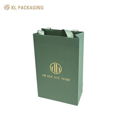 China Full Color Printing Green Color Paper Shipping Bag With Handle Gift Packaging Bag for sale