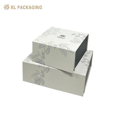 China Floral Klapppapierboxen Kartenpapier Einfügen Magnetische Teepapierverpackungskiste zu verkaufen