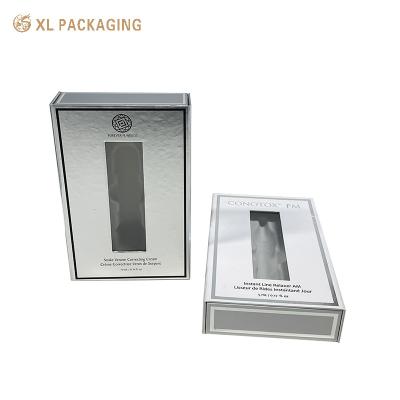 China Caja de papel cosmético de lujo de plata magnética, caja de perfume con ventana en venta