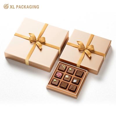 China Embossed Custom CMYK Packaging Chocolate Candy Lid Base Artpaper Box with Ribbon Base for sale