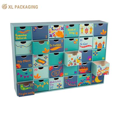 China 24pcs cajón de regalos cajas de papel cosméticos Navidad calendario de Adviento caja de embalaje con estampado en caliente interior exterior en venta