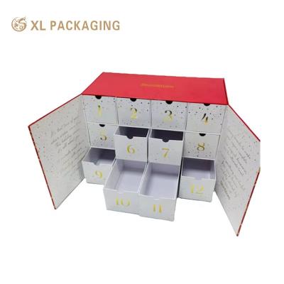 China Weihnachtsdruckdesign Adventskalender Box 12 24 Tage Sternbaumart Innenfarbe Hautpflege Kosmetik Geschenkbox zu verkaufen