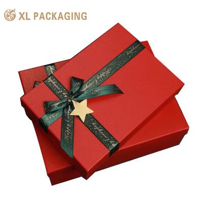 China Custom Logo Printing Luxury Design Cardboard Paper Box , Clothes Skincare Festival Gift Packaging Box With Ribbon Bow for sale