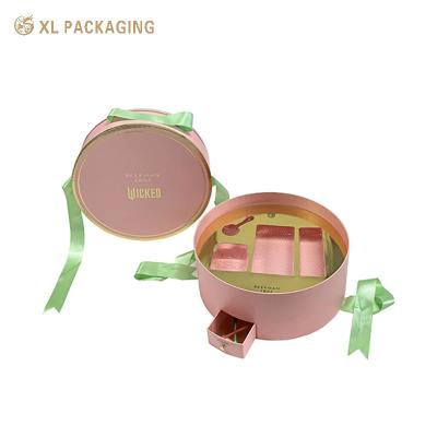 China Caja redonda de papel cosmético con un diseño único Mini cajón caja de cinta verde mango y bandeja de oro para artículos de belleza esenciales en venta