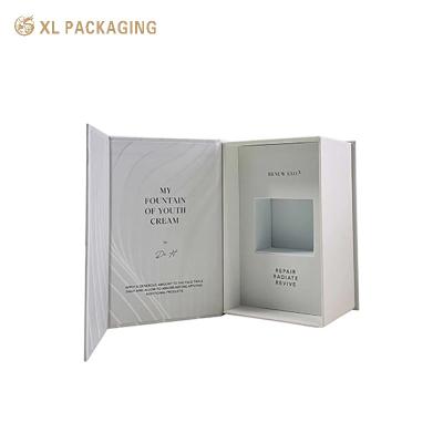 China Cosmetic Kraft Paper Gift Box Black Gold Foil Magnet Cosmetic Box Packaging With EVA Inserts for sale