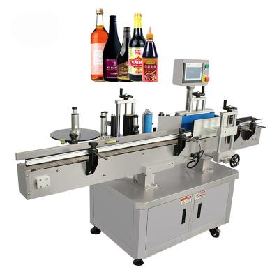 China Food Essential Oil Round Bottle Labeling Machine Sleeve Shrink Labeling Machine for sale