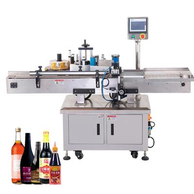 China Food Wine Wrap Round Bottle Labeling Machine High Quality Cold Glue Label Machines for sale