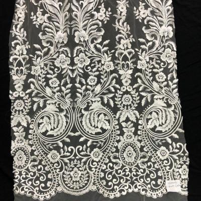 China High quality workable white heavy embroidery lace fabric for wedding dress for sale