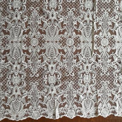 China 2017 New Embroidery Sequins Tulle Lace Fabric For Wedding for sale