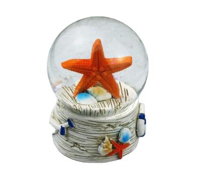 China Europe Tropical ornament beach ocean decoration resin starfish water globe for sale