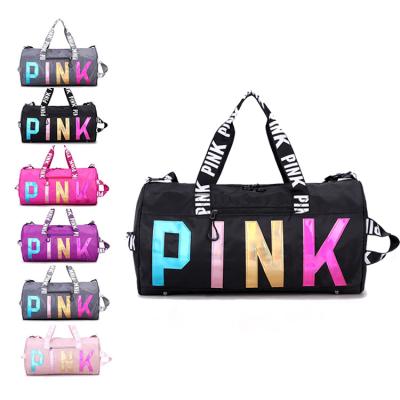 China Large Capacity Eco-Friendly Women Travel Bag Pink Gym Sport Zipper Luggage Fitness Training Waterproof Duffel Bag for sale