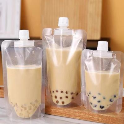 China Moisture Proof Reusable Clear Plastic Drink Pouches With Logo Beverage Spout Liquid Pouch for sale